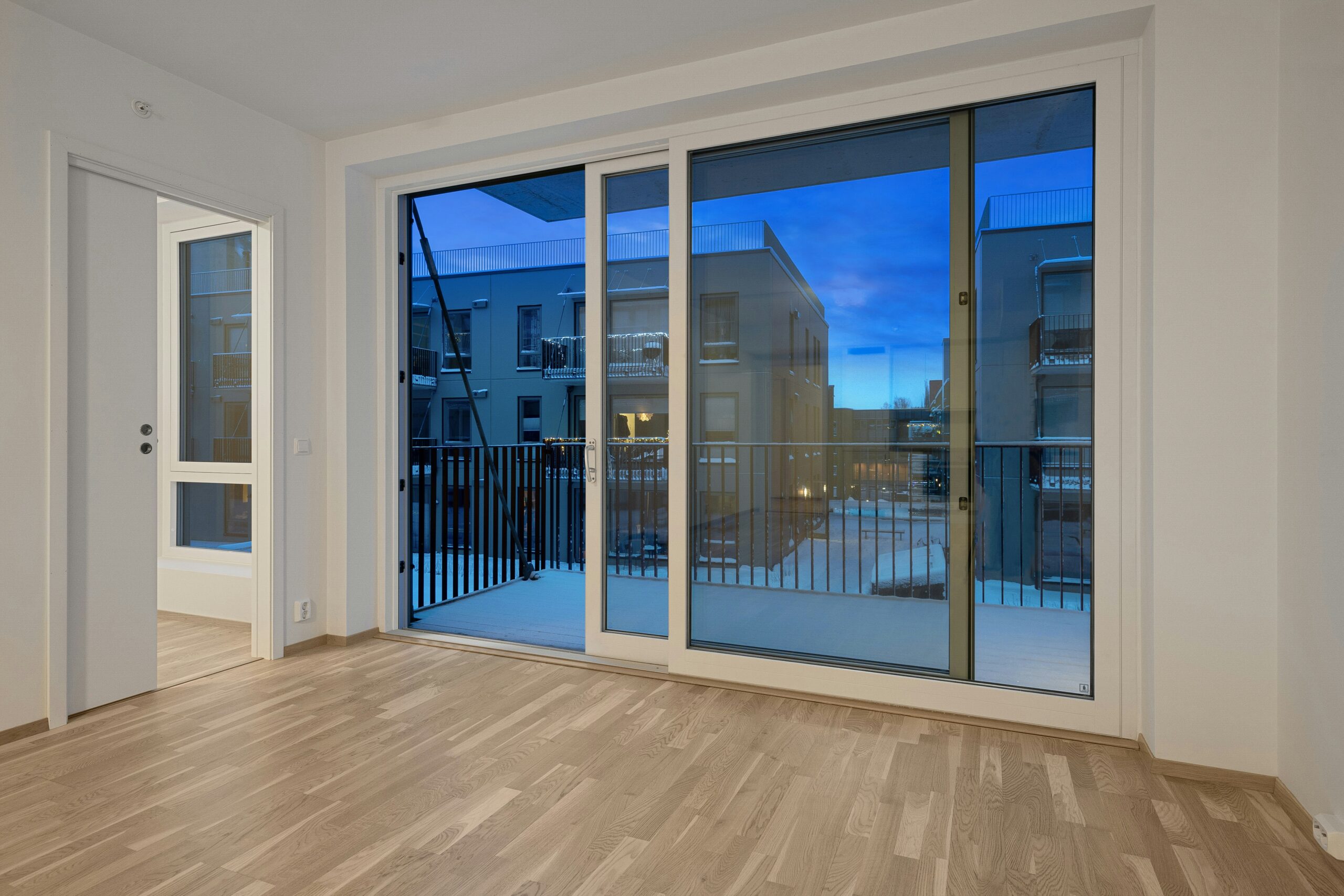 Are Impact-Resistant Sliding Doors Worth It in Hollywood, FL? A secure, impact-resistant sliding doors installed in a Hollywood home.